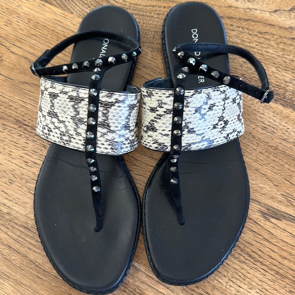 Donald J Pliner snake thong sandals with studded ankle straps.